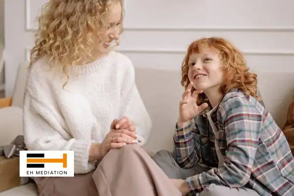 Happy mother and child after sorting child arrangements mediation Cumbria